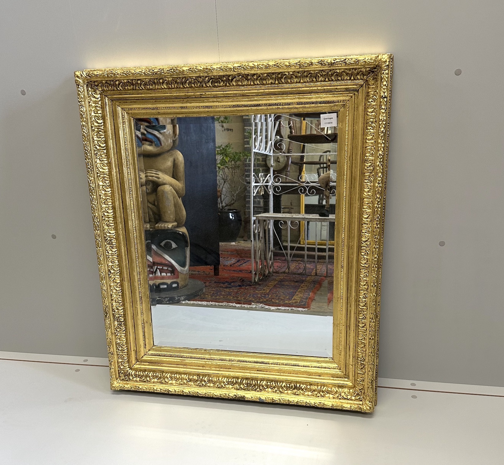 A Victorian giltwood and composition 'picture frame’, now as a wall mirror, width 82cm, height 95cm